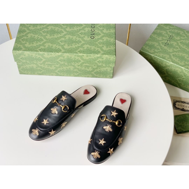 G*u*i slippers